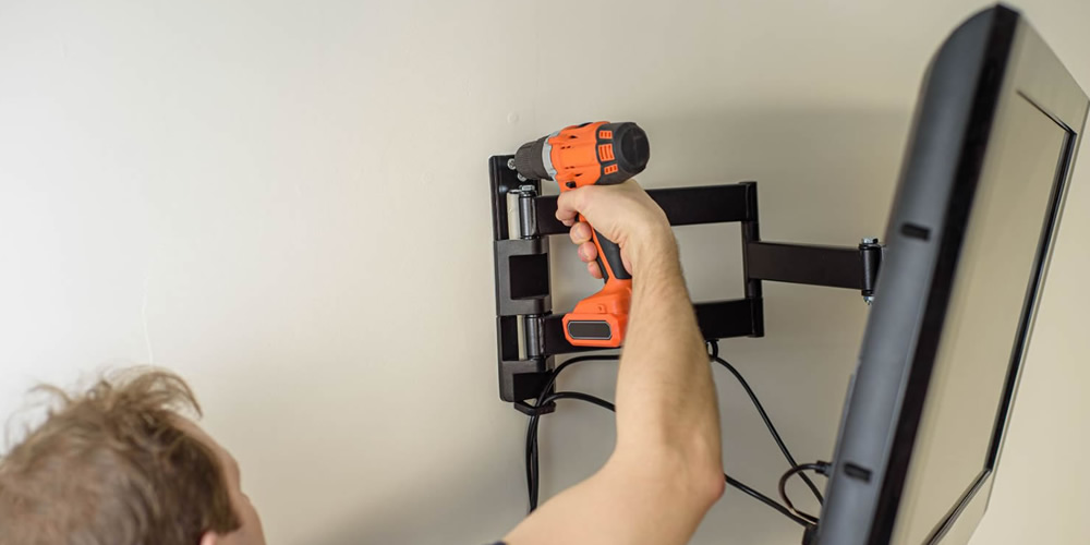 Handyman working on a wall