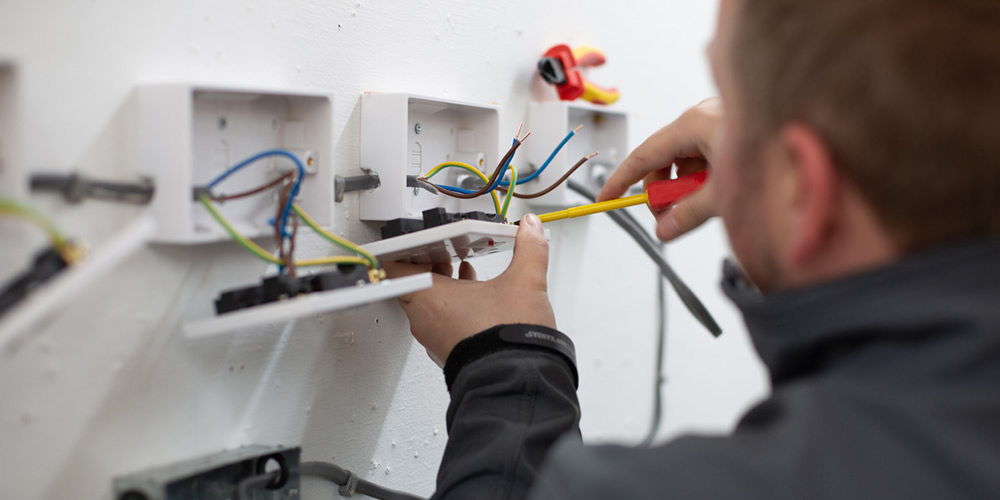 Handyman slicing a stone